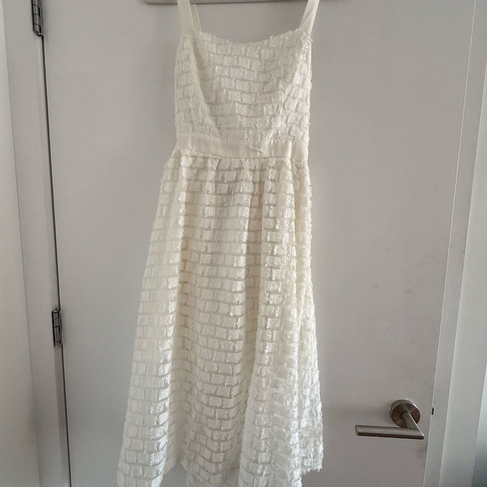 Elegant White Tea Length Dress with bow back